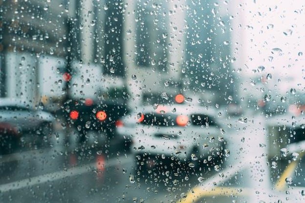 Rainy day in the city viewed through the car window