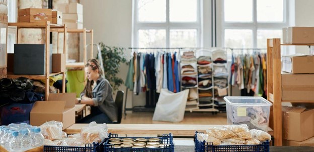 A woman packing her things in the storage room